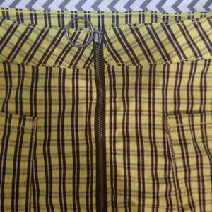 A pink and green plaid skirt